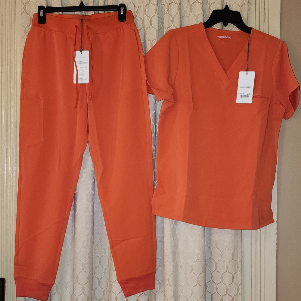 Scrub set, size Medium one pocket top, joggers size small.